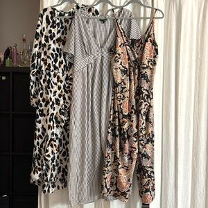 Set of 3 items 1 duster, 1 wrap dress and one jumpsuit .. appropriately size 3x